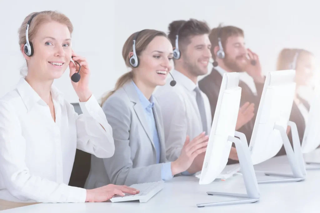 Telemarketing workers with professional headsets
